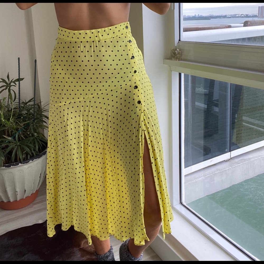Yellow skirt with black dots